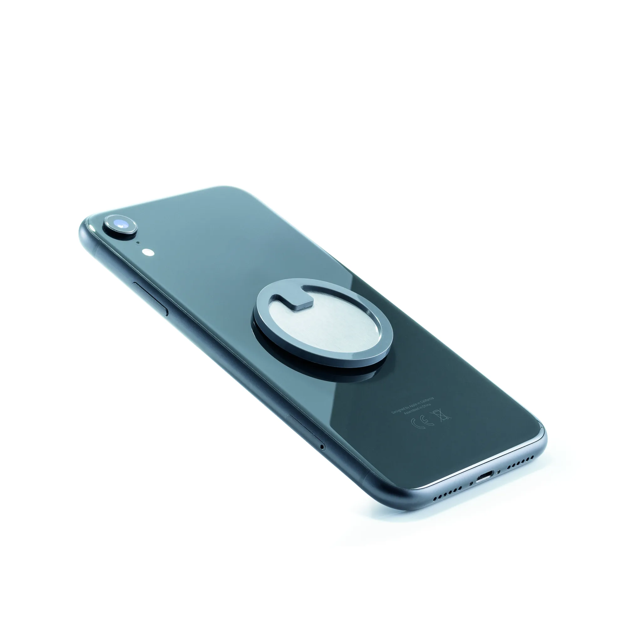 Smartphone mit der Alber Mobility App und Bedienpuck
